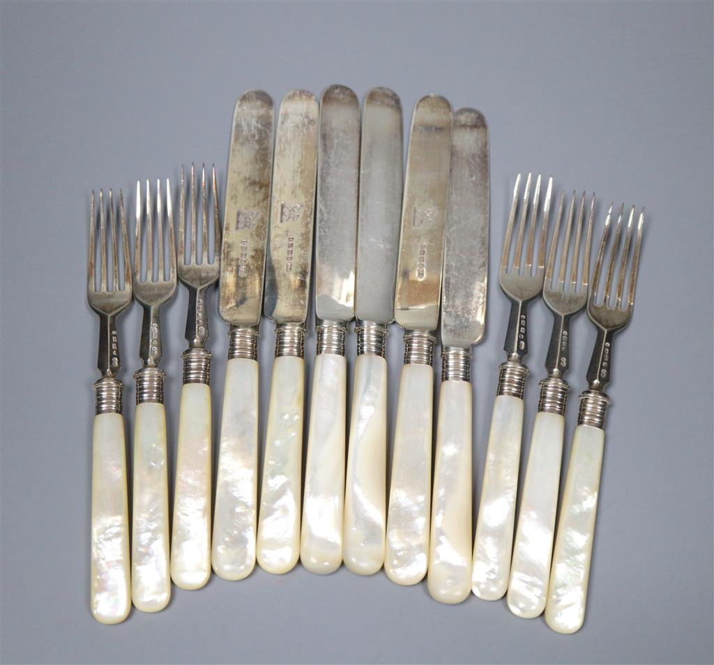 Six pairs of Victorian silver dessert eaters with mother of pearl handles, Birmingham 1885.